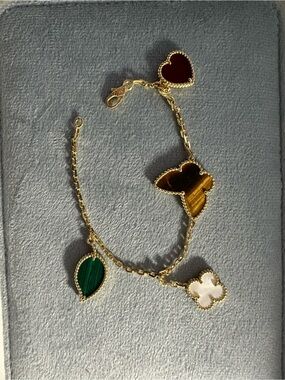 Gold Charm Bracelet with Multicolor Stone Hearts and Clover